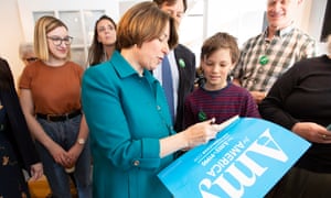 Amy Klobuchar autographs a campaign placard following a ‘meet and greet’ at the Waterhouse Resturant in Peterborough, New Hampshire, last month.