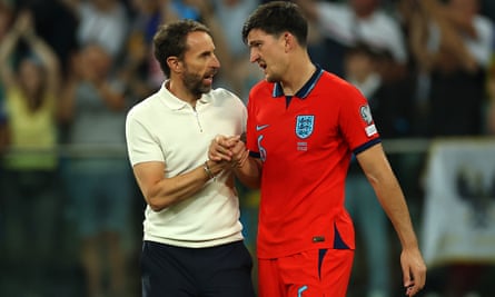 Gareth Southgate talks to Harry Maguire of England after the Euro 2024 European qualifier against Ukraine.