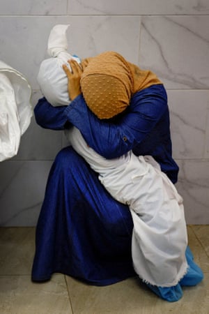 “People were confused, running from one place to another, anxious to know the fate of their loved ones, and this woman caught my eye as she was holding the body of the little girl and refused to let go.” The moment was particularly poignant for Salem, whose wife had given birth to their own child just days previously. The photograph won the 2024 World Press Photo