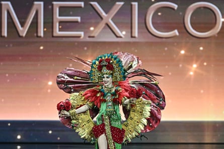 Miss Mexico Fatima Bosch walks on stage during the national costume presentation