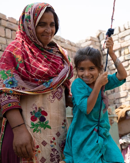 Sultana with Ayra, who swings happily in their home. The family were unable to afford food and Ayra became malnourished. After receiving treatment at Cafod’s mobile health unit, she made a full recovery.