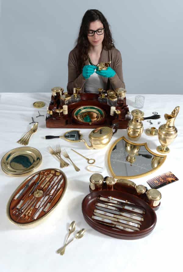 A cabinet of curiosities … Isabel Wagner, assistant conservator, cleans the Borghese travelling service.