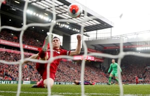 James Milner clears the ball off the line to preserve Liverpool’s 2-1 lead against Bournemouth in March 2020