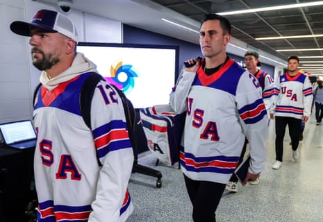 More US players arrive wearing the Olympic hockey team’s game-used jerseys from last month’s gold medal game in Milan.