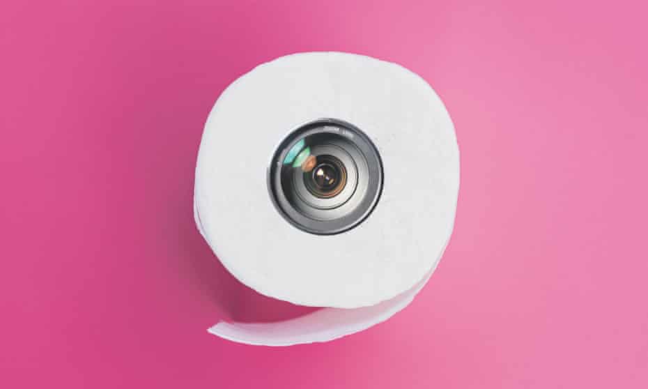 Toilet roll with a camera in the centre