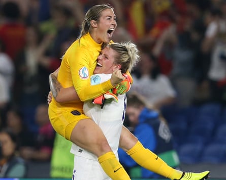 Mary Earps celebrates with team-mate Millie Bright during their victorious Euro campaign in 2022.
