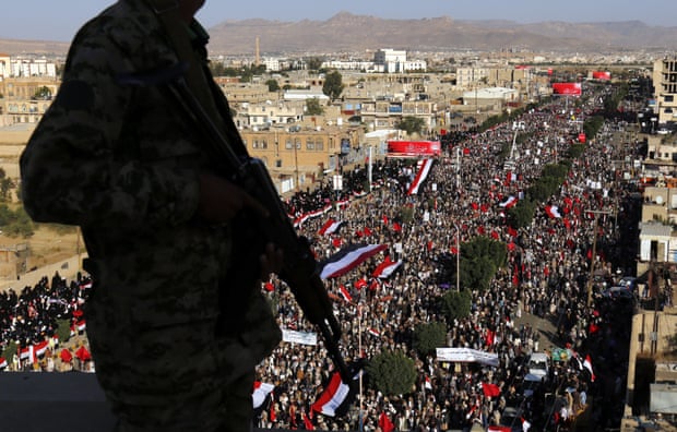 A Houthi militiaman keeps watch as Shia Muslims take part in Ashura Day celebrations in Sana’a.