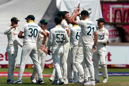 Australia's players celebrate after their win.