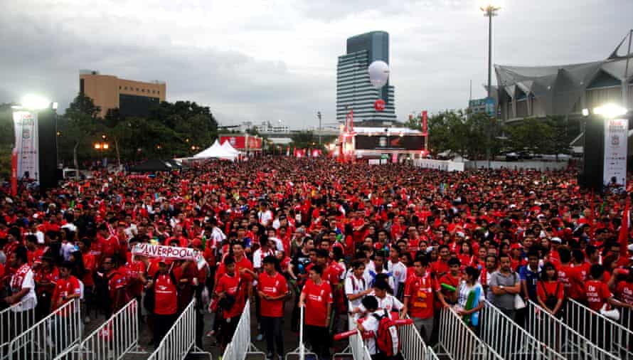 Liverpool fans wait to enter Bangkok’s Rajamangala Stadium for the team’s game against Thai Premier League All Stars in July 2014.