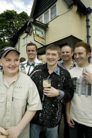 Ricky Hatton relaxes with friends outside his local pub the New Inn, in Hyde, Manchester, after defeating Kostya Tszyu in his IBF light-welterweight title fight.