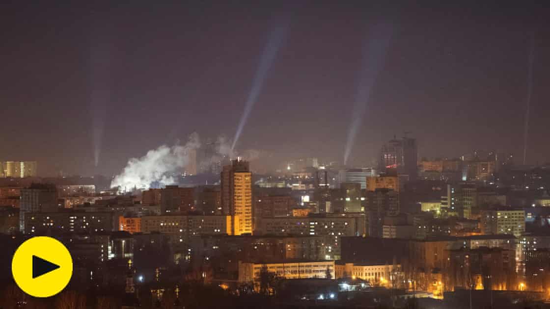 Russia launches huge Ukraine drone attack on eve of third anniversary of invasion – video report