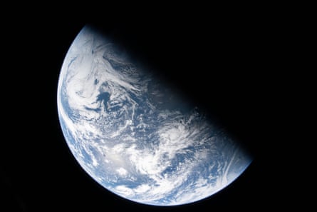 This image, taken from the Orion capsule, shows the divide between night and day, known as the terminator, cutting across Earth.