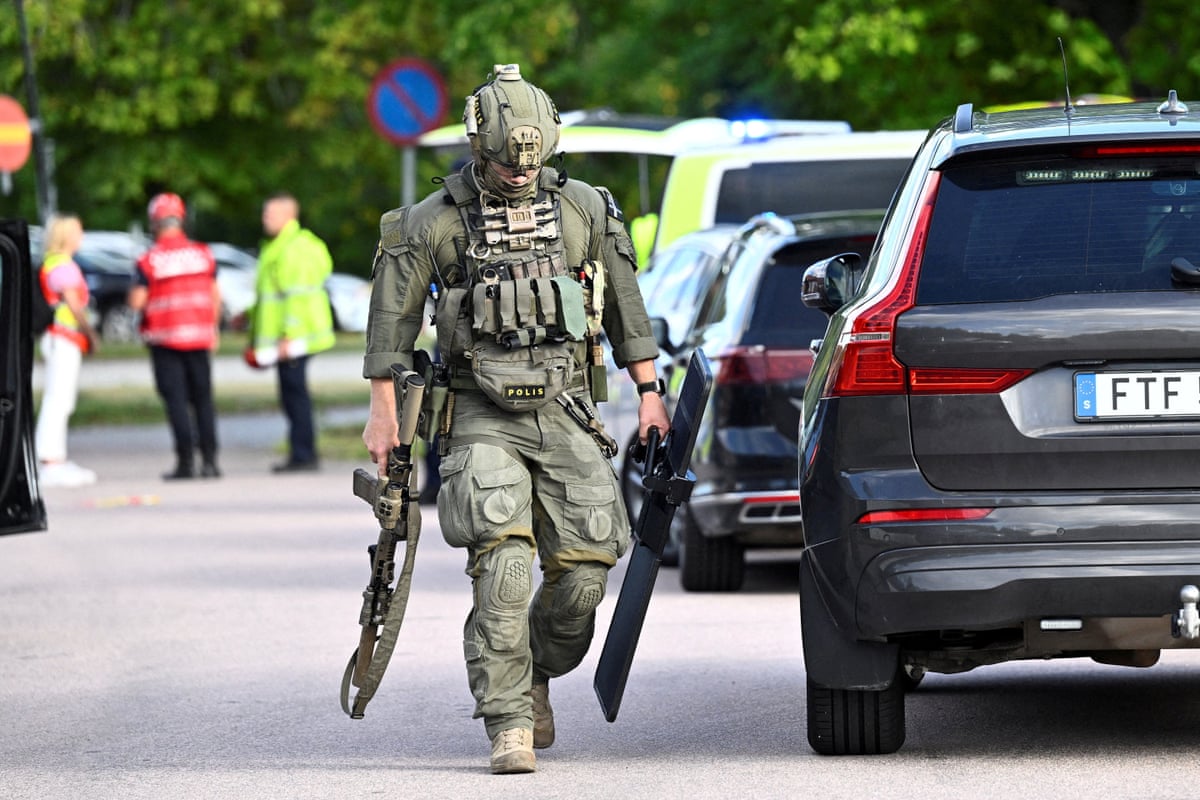 An armed police officer