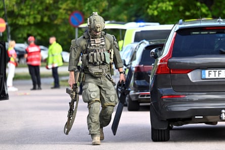An armed police officer