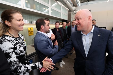National Party leader Christopher Luxon speaks with workers on the campaign trail.