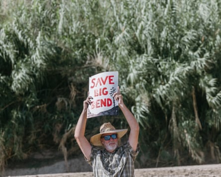 A man holding a sign.