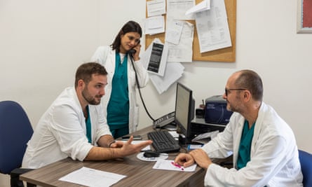 Dr Francisco Javier Pereyra (left), Dr Laura Ator and Dr Martin Venturini work at the Maria Immacolata Longo hospital of Mussomeli.