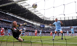 Paddy Kenny fails to stop the shot from Pablo Zabaleta crossing the line for the first City goal.