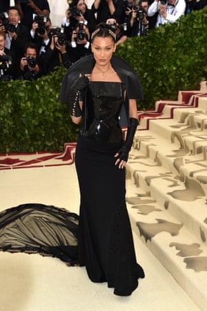 Bella Hadid went for fallen angel with her all-black Chrome Hearts outfit, complete with latex bodice, long-sweeping skirt and bolero jacket. The 21-year-old model is practically a veteran of the Met Gala; this year marks her fourth invitation.