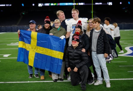 Max Hoke, an offensive linesman from Sweden for the NFL Academy, is greeted by family and friends on the pitch straight after the match against De La Salle Spartans from California.
