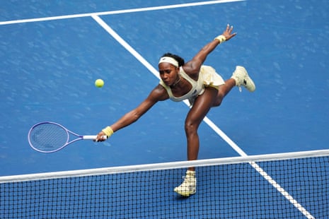 Coco Gauff stretches for a return to Mirra Andreeva.