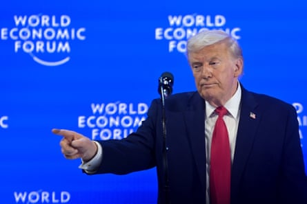 Donald Trump pointing while on stage at Davos