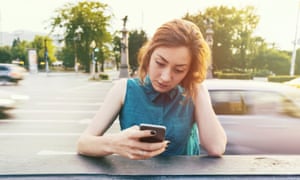 Woman looking at smartphone