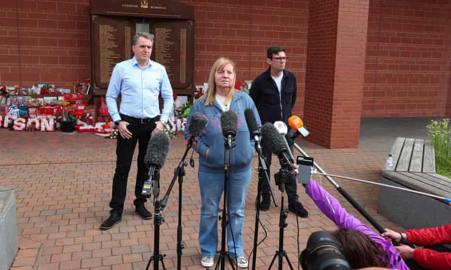 Margaret Aspinall with mayor of Liverpool, Steve Rotheram (left) and Andy Burnham outside Anfield, 26 May 2021.