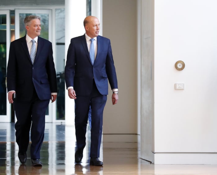 Peter Dutton arrives with Mathias Cormann for the party-room meeting