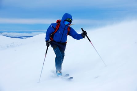 Kathryn Grindrod skis along a snowy ridge