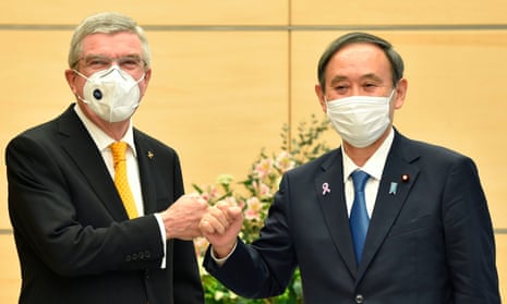 International Olympic Committee president Thomas Bach (L) meets Japan’s prime minister, Yoshihide Suga, in Tokyo.