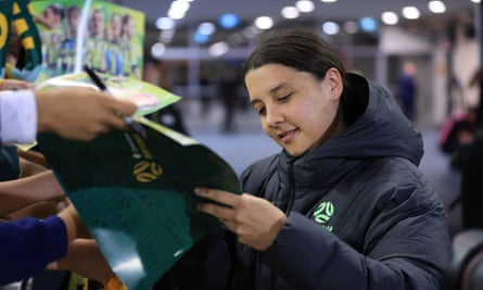 Sam Kerr signs autographs during a Matildas friendly in Newcastle