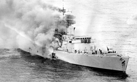 Smoke billows from HMS Sheffield after it was hit by an Exocet missile in 1982.