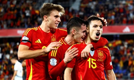 Spain’s Bryan Zaragoza (right) celebrates his last-gasp match-winning penalty with Marc Casado and Pablo Barrios.