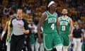 Celtics guard Jrue Holiday (4) celebrates near the end of Saturday’s Game 3 of the Eastern Conference finals against the Pacers in Indianapolis.