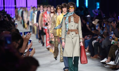 In this image released on June 15th, models walk the runway during