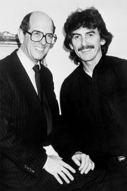 Balance … US financier Denis O’Brien with George Harrison.