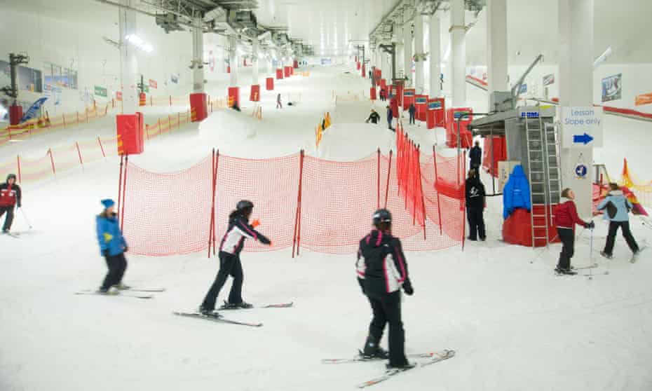 People skiing in the indoor ski slope at Xscape in Milton Keynes.