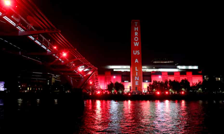The Tate Modern in London lit up in red