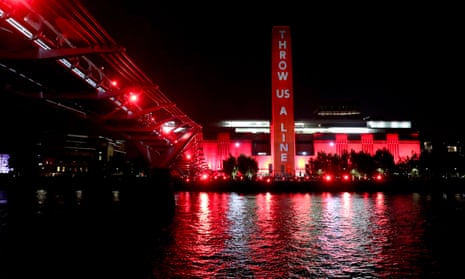 Tate Modern is lit up in red to highlight the effects of the pandemic on the arts