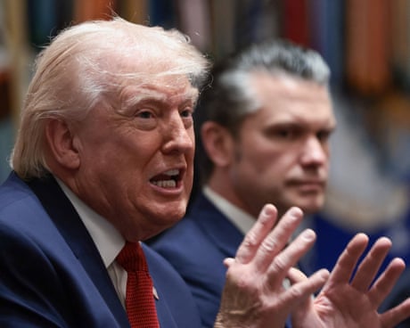 Trump speaks next to Pete Hegseth during a meeting at the White House in Washington DC.