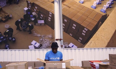 people working inside the UNICEF warehouse, the world’s largest humanitarian aid warehouse, in Copenhagen