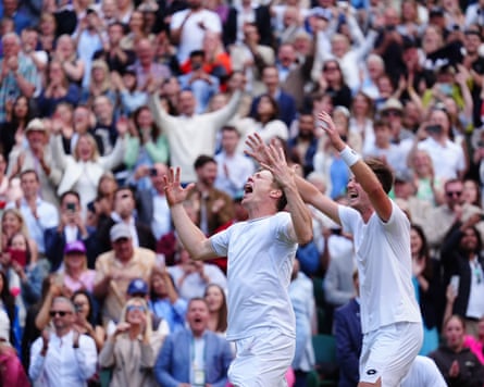 Henry Patten (right) and Harri Heliövaara celebrate their final win over Max Purcell and Jordan Thompson at Wimbledon last year.
