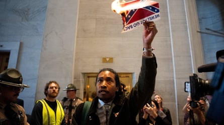 Democratic authorities typical Justin Jones burning photograph of nan confederate flag.