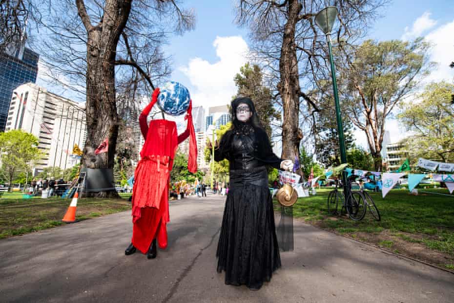 Protesters at an Extinction Rebellion rally at the Carlton Gardens camp in Melbourne on Friday