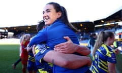 Emma Samways hugs a Hashtag United teammate after the Women's National League Cup final.