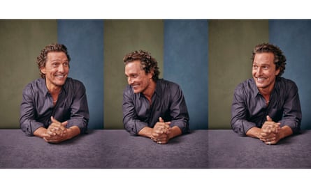 A triptych of portraits of a smiling Matthew McConaughey sat at a table with his hands clasped together on it