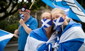 Members from All Under One Banner take part in a demonstration for Scottish independence outside the Scottish parliament in Edinburgh. 