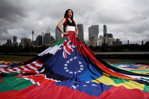 Actor, theatre critic and trans woman, Suzy Wrong poses in Sydney on 21 September in a dress art made of the national flags of the 71 countries where it is still illegal to be LGBTQIA+. The dress is over 3.5m in height and 16m in diameter. Sydney will host a major LGBTQIA+ human rights conference as part of Sydney WorldPride 2023.