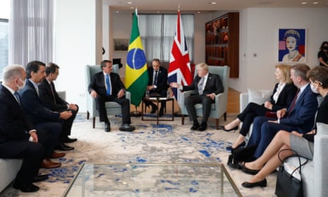 The Brazilian president, Jair Bolsonaro, and Boris Johnson at a bilateral meeting in New York. Brazil’s health minister, who has since tested positive, is on the far left.